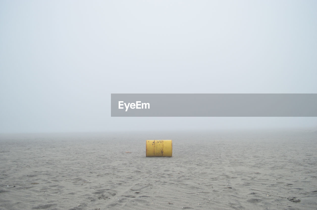 Lifeguard hut on beach against clear sky