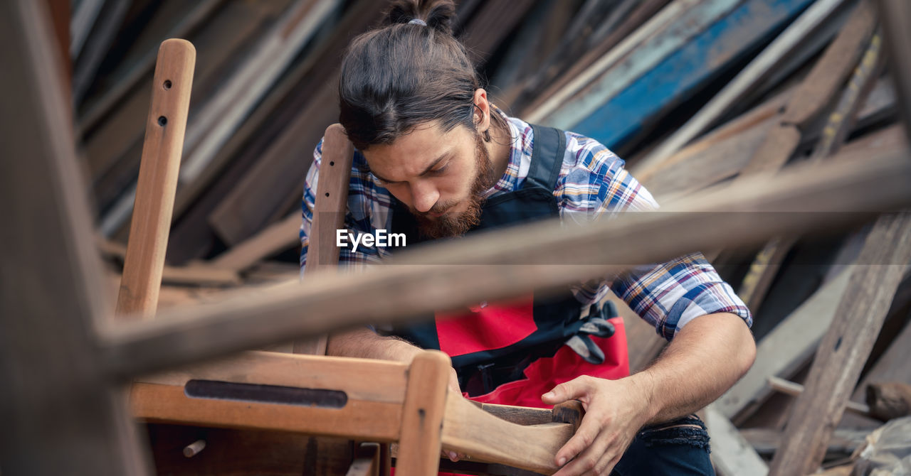 Man working on wood