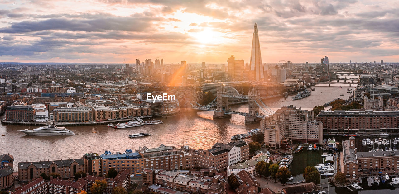 Aerial panoramic sunset view of london tower bridge and the river thames