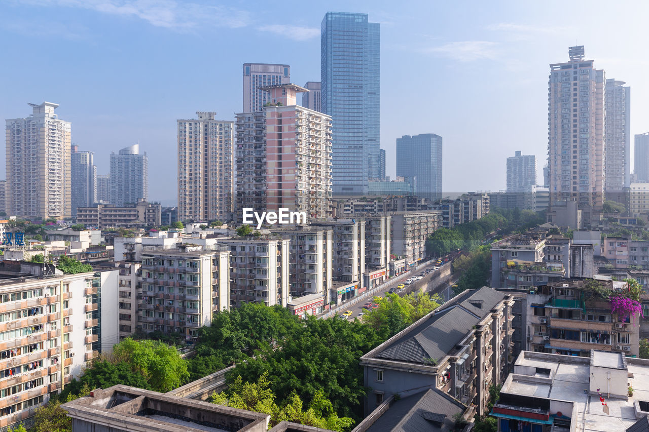 MODERN BUILDINGS AGAINST SKY IN CITY