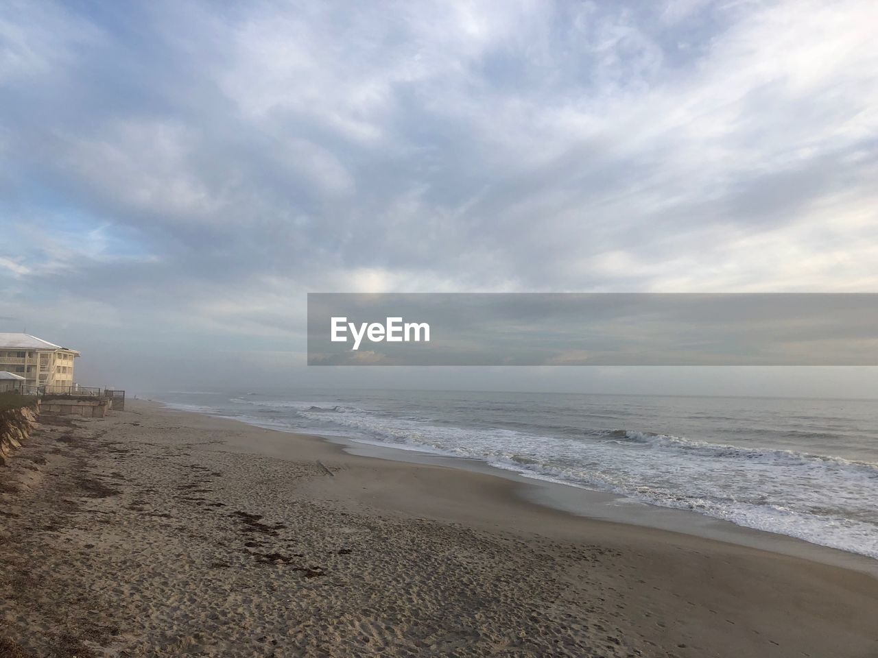 VIEW OF BEACH AGAINST SKY