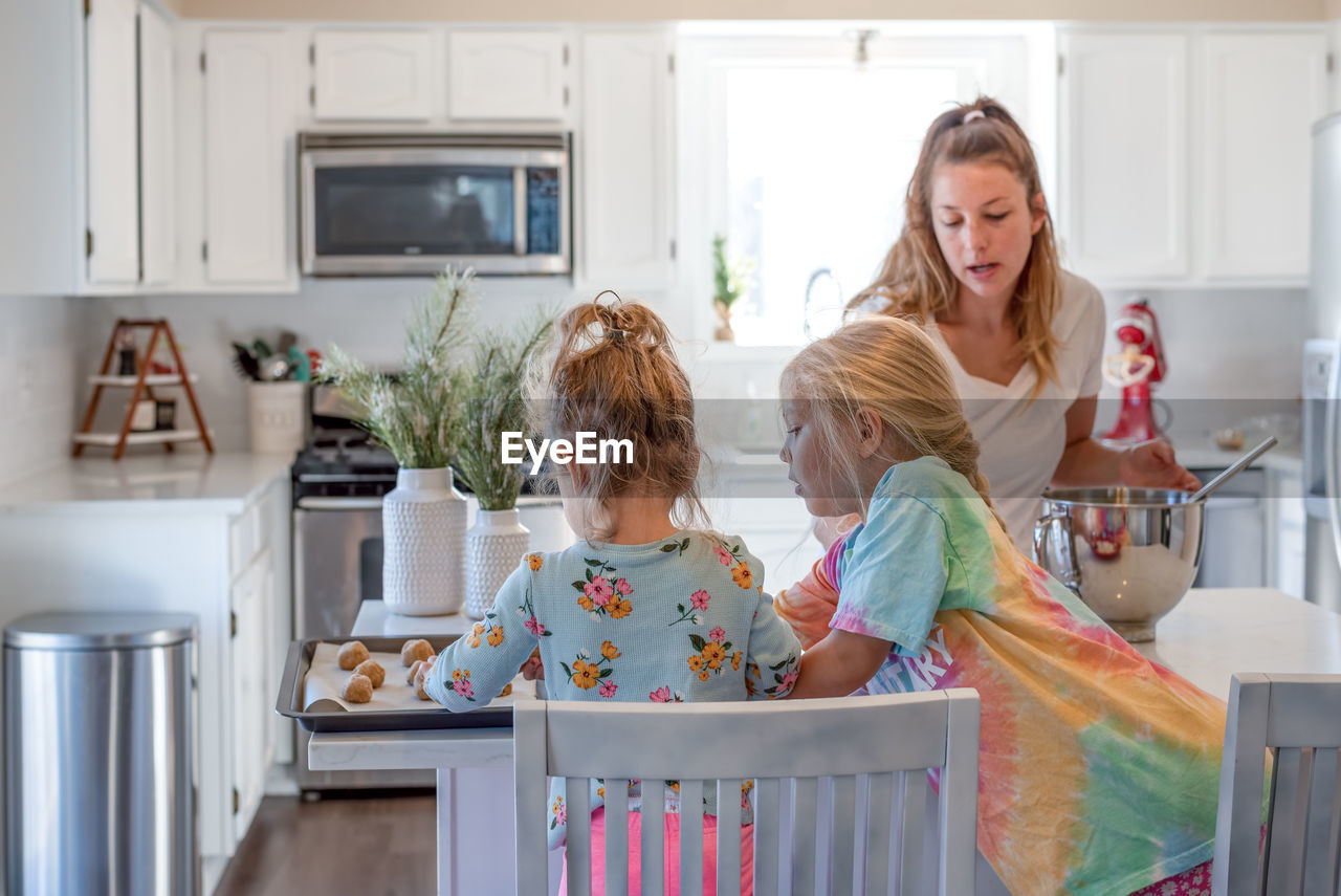 Women in kitchen at home