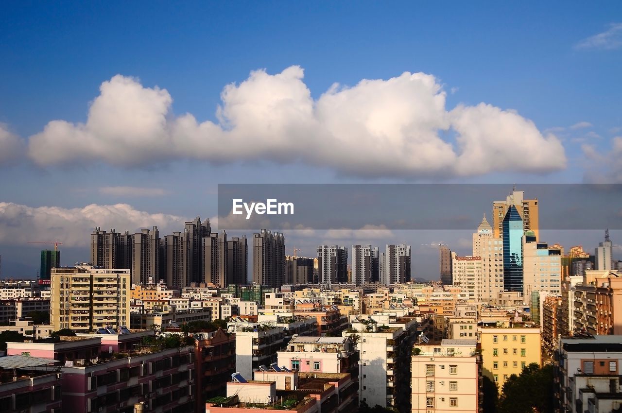 Panoramic view of cityscape against sky