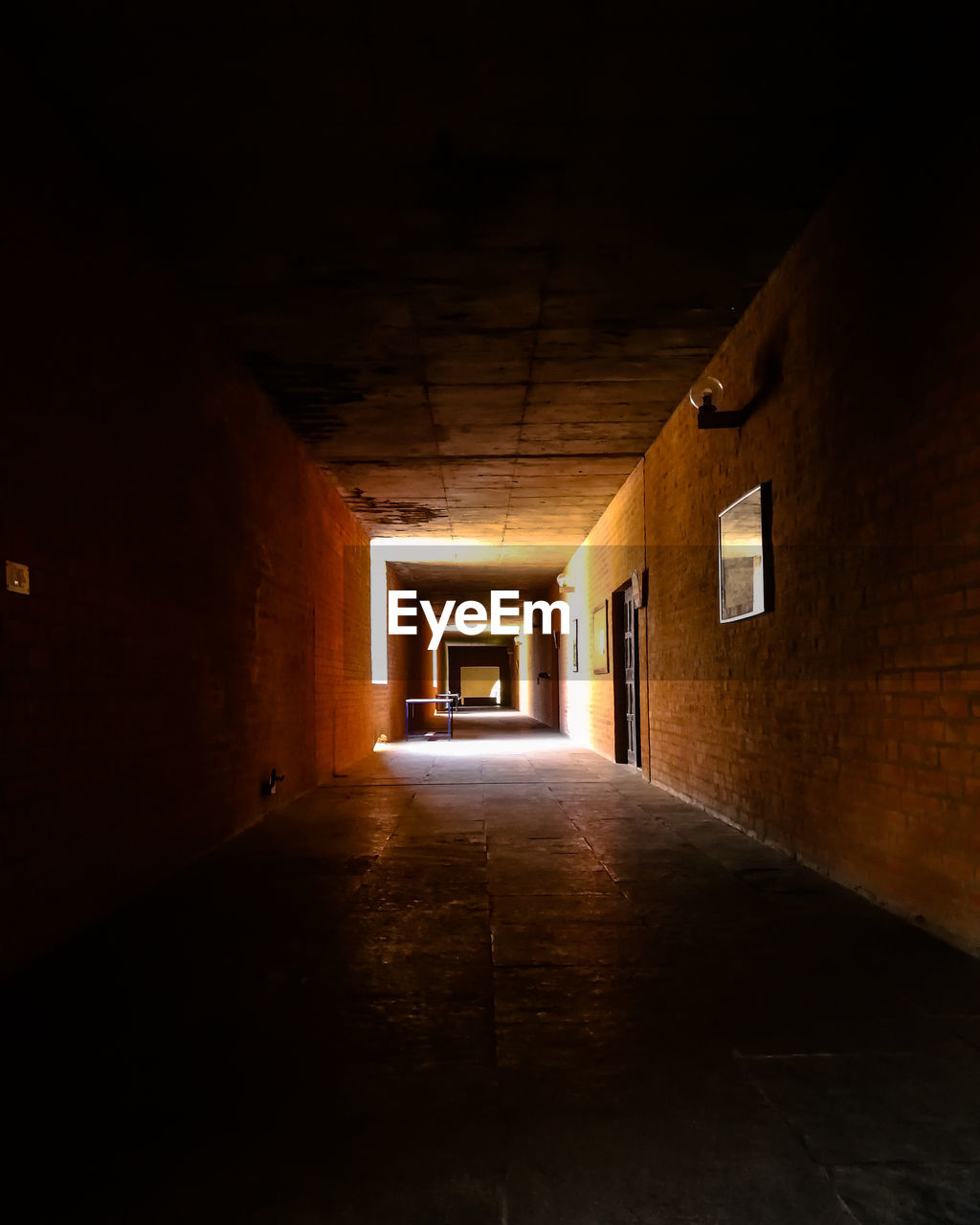 VIEW OF EMPTY CORRIDOR IN BUILDING