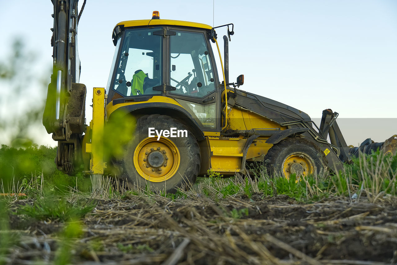 YELLOW WHEEL ON FIELD