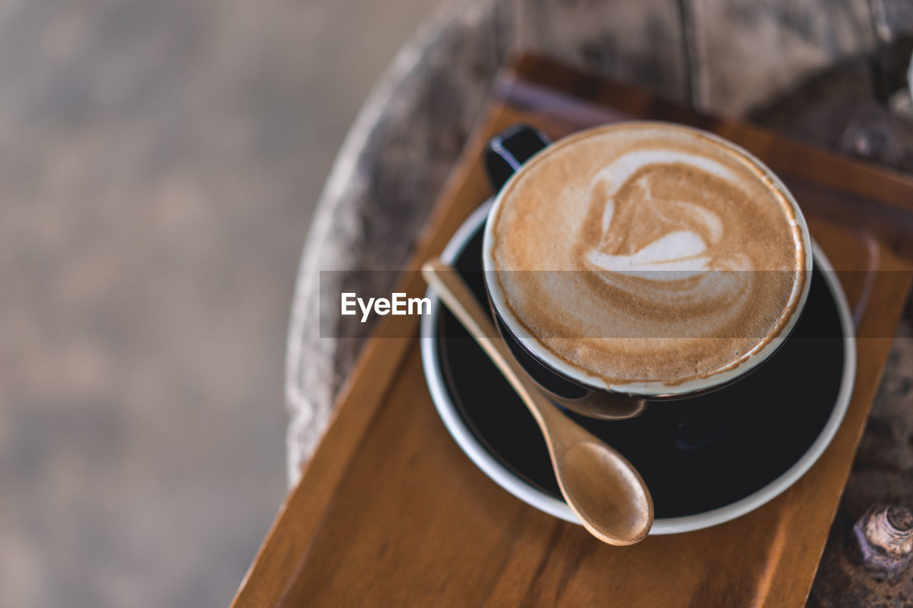 Close-up of coffee cup on table