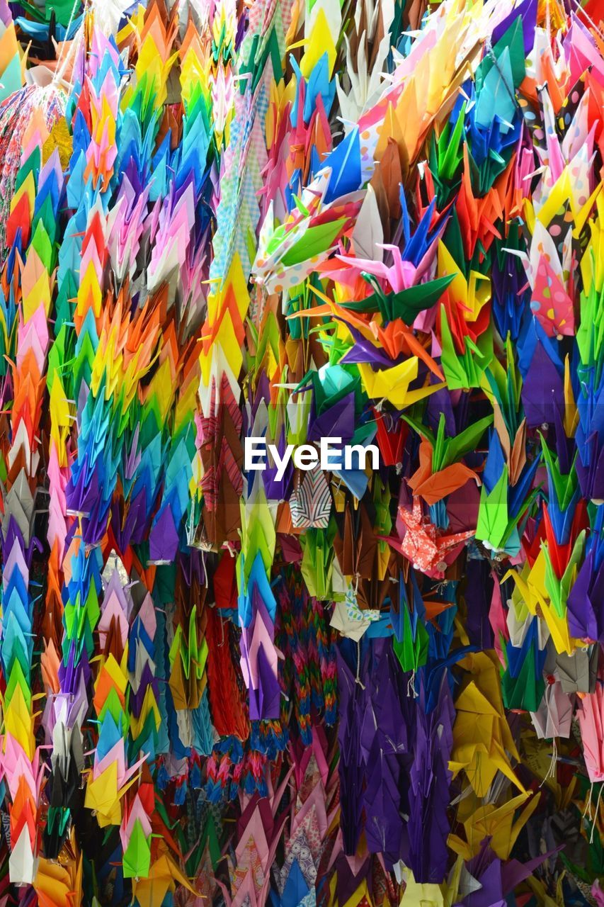 Full frame shot of multi colored paper cranes