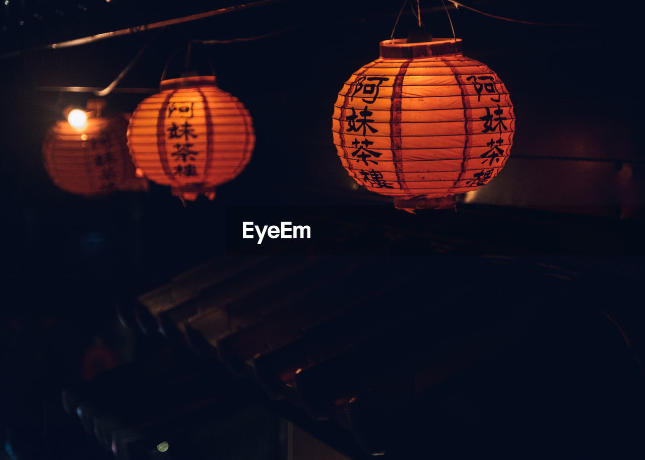 Close-up of illuminated chinese lanterns at night