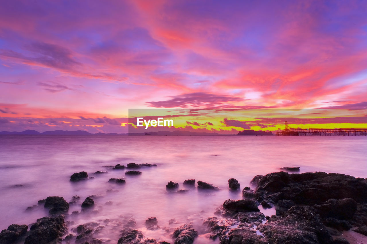 Scenic view of sea against sky during sunset