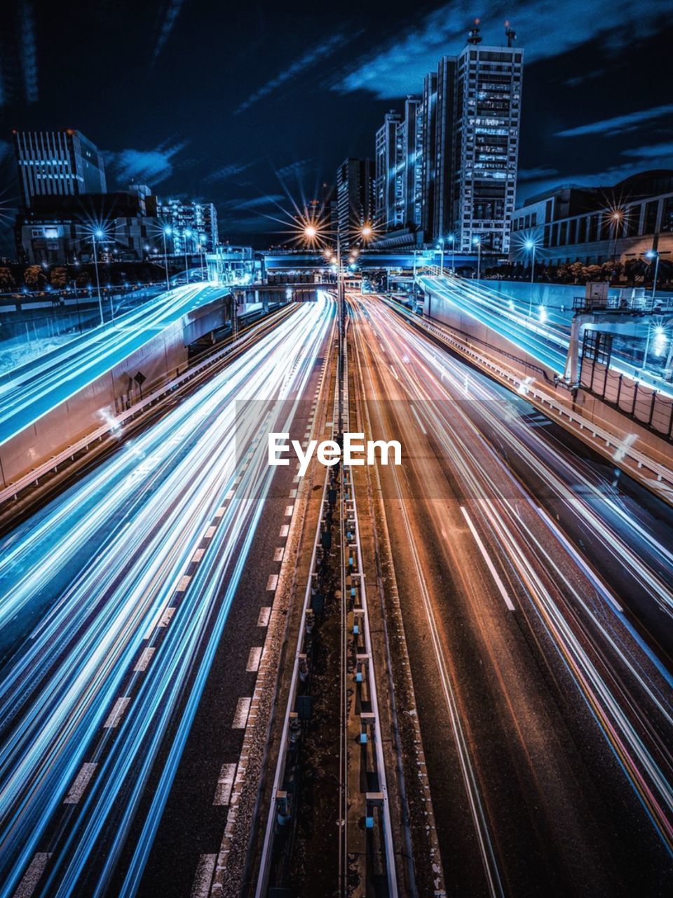 High angle view of light trails on city street