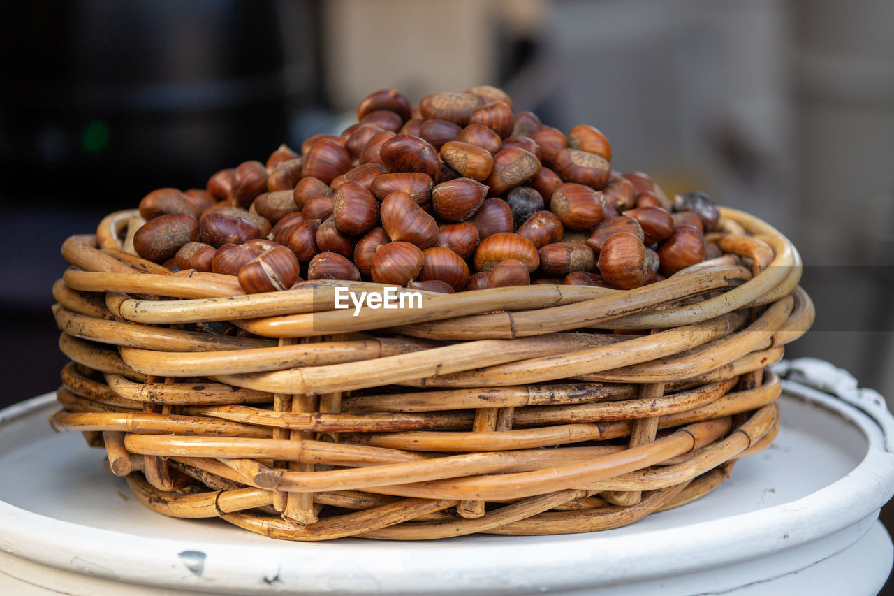 food and drink, food, basket, freshness, container, healthy eating, produce, no people, wellbeing, abundance, brown, large group of objects, market, focus on foreground, snack, heap, city, business, business finance and industry, close-up, wicker, dish