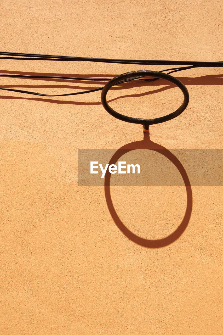 Low angle view of basketball hoop on wall