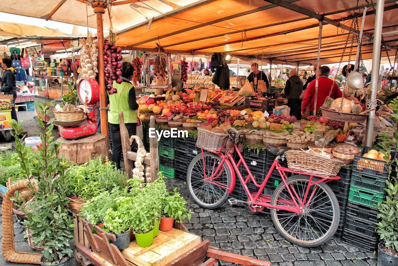 People shopping in market