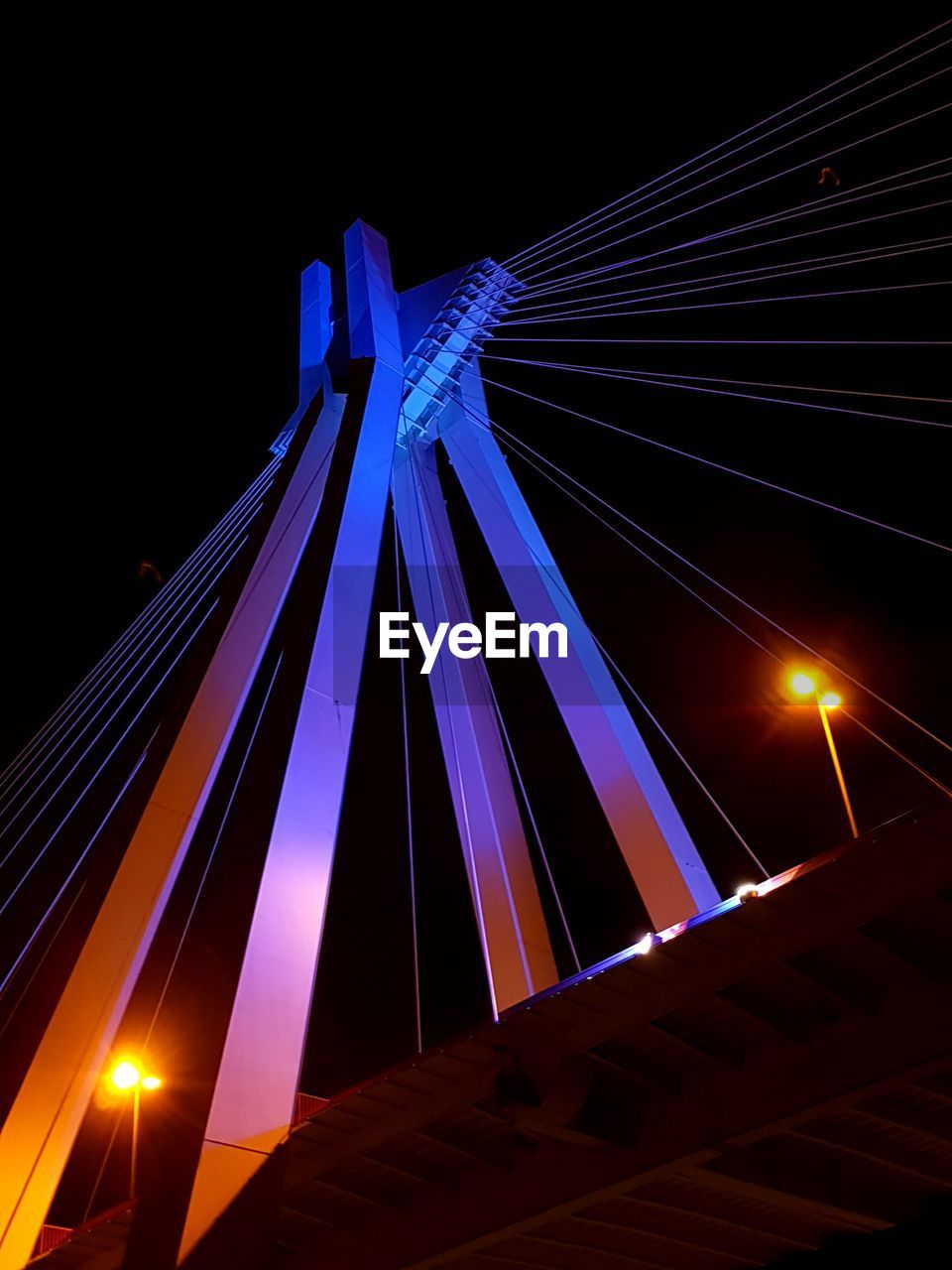 LOW ANGLE VIEW OF ILLUMINATED LIGHT AT NIGHT