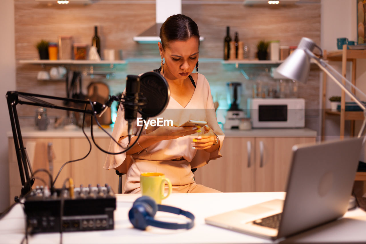 portrait of young businesswoman working at desk in office