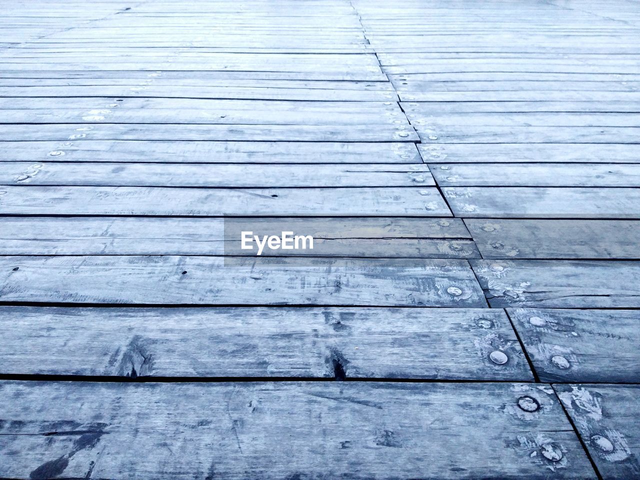Surface level shot of wooden planks on floor