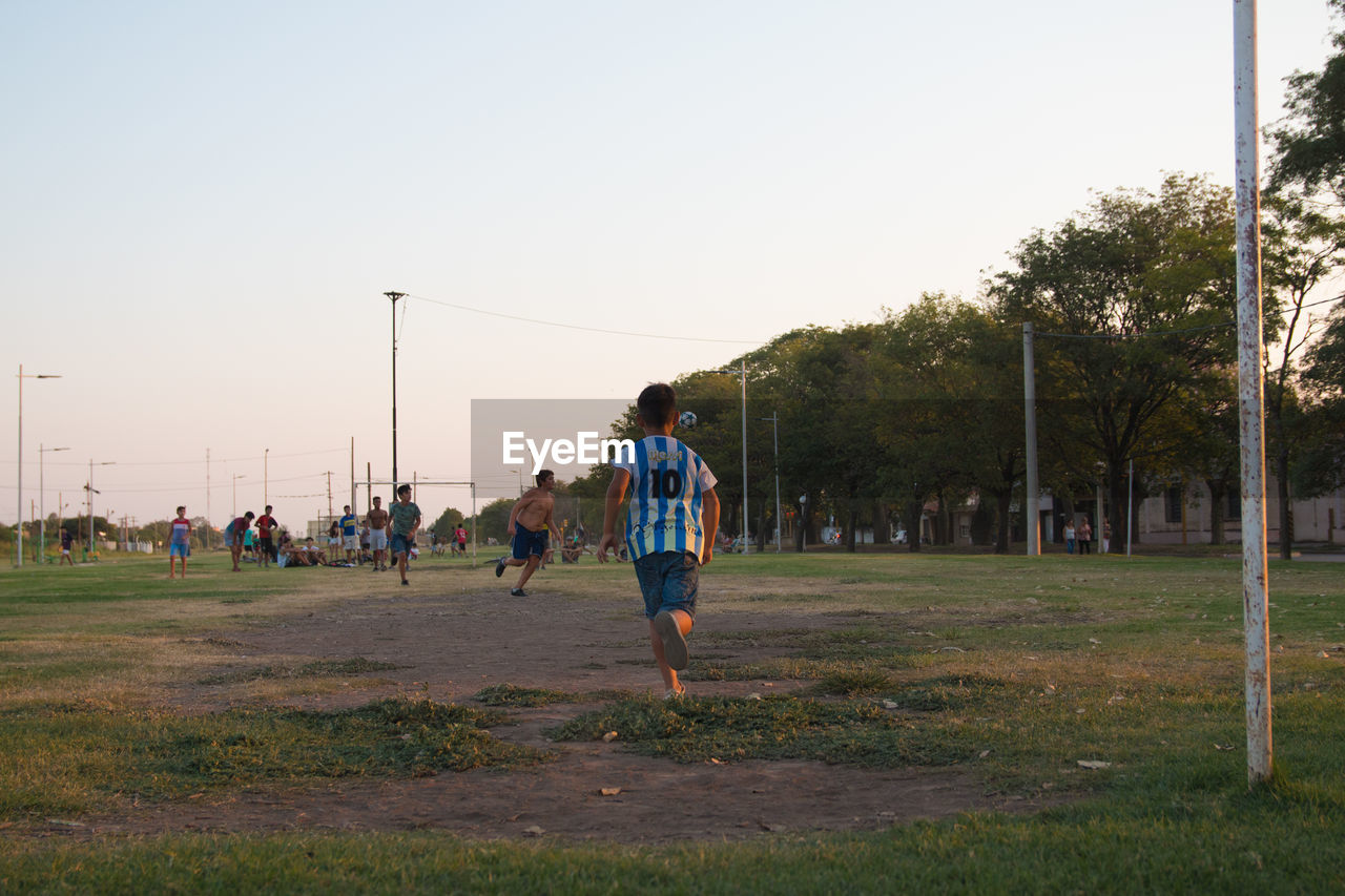 Young men soccer street match