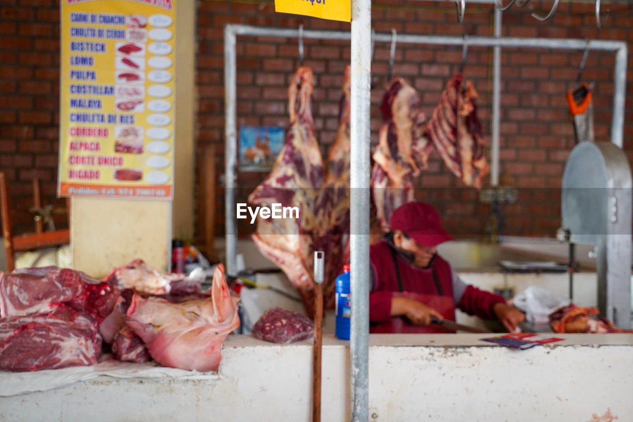 slaughterhouse, meat, food, food and drink, market, butcher, business, retail, freshness, animal, market stall, hanging, for sale, animal themes, occupation, raw food