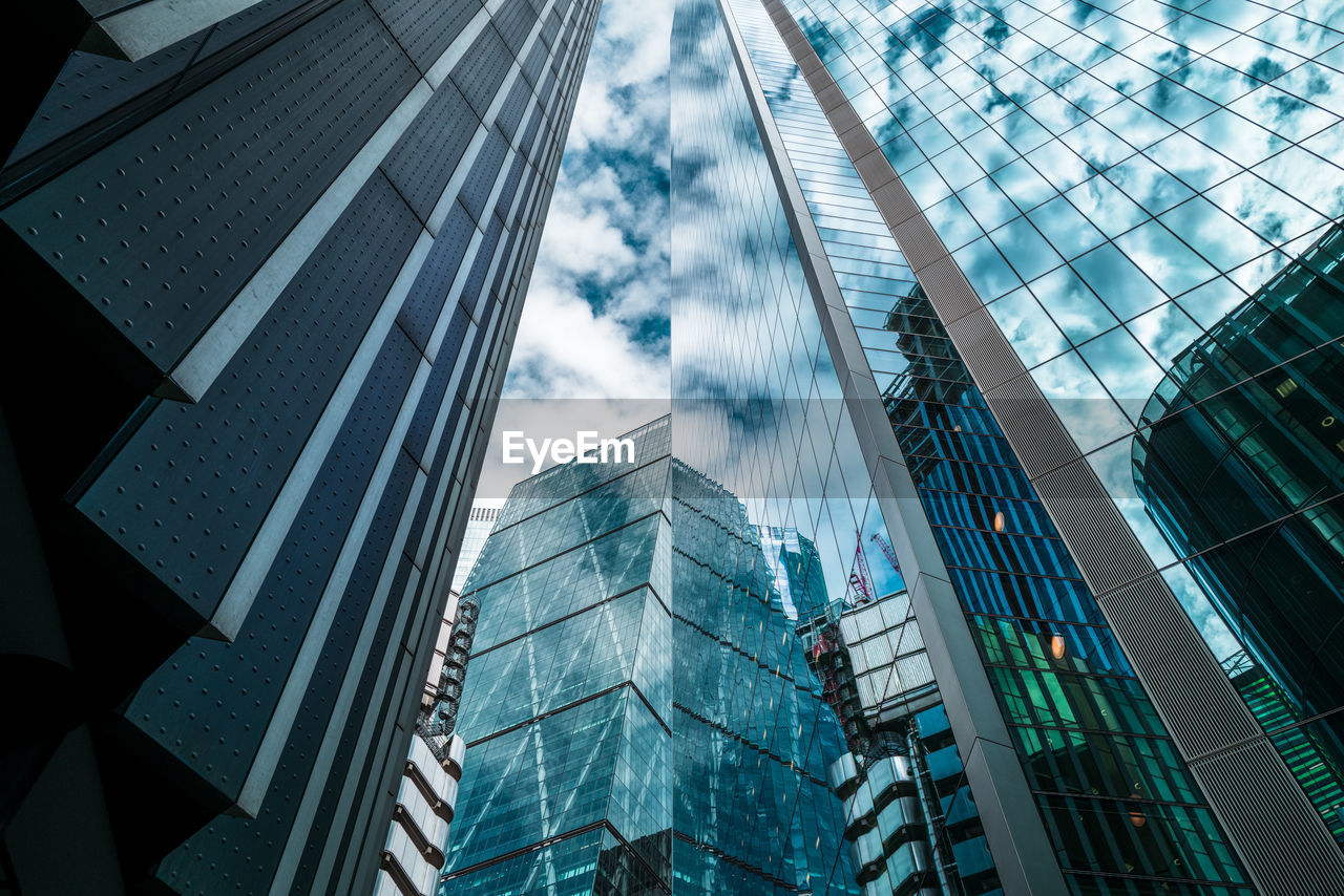 Low angle view of modern buildings against sky