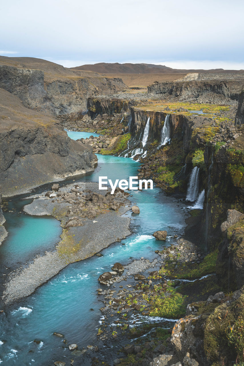 High angle view of river amidst rocks