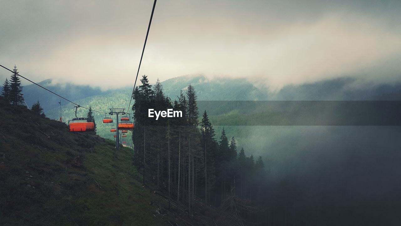 Low angle view of ski lifts at tatra mountains