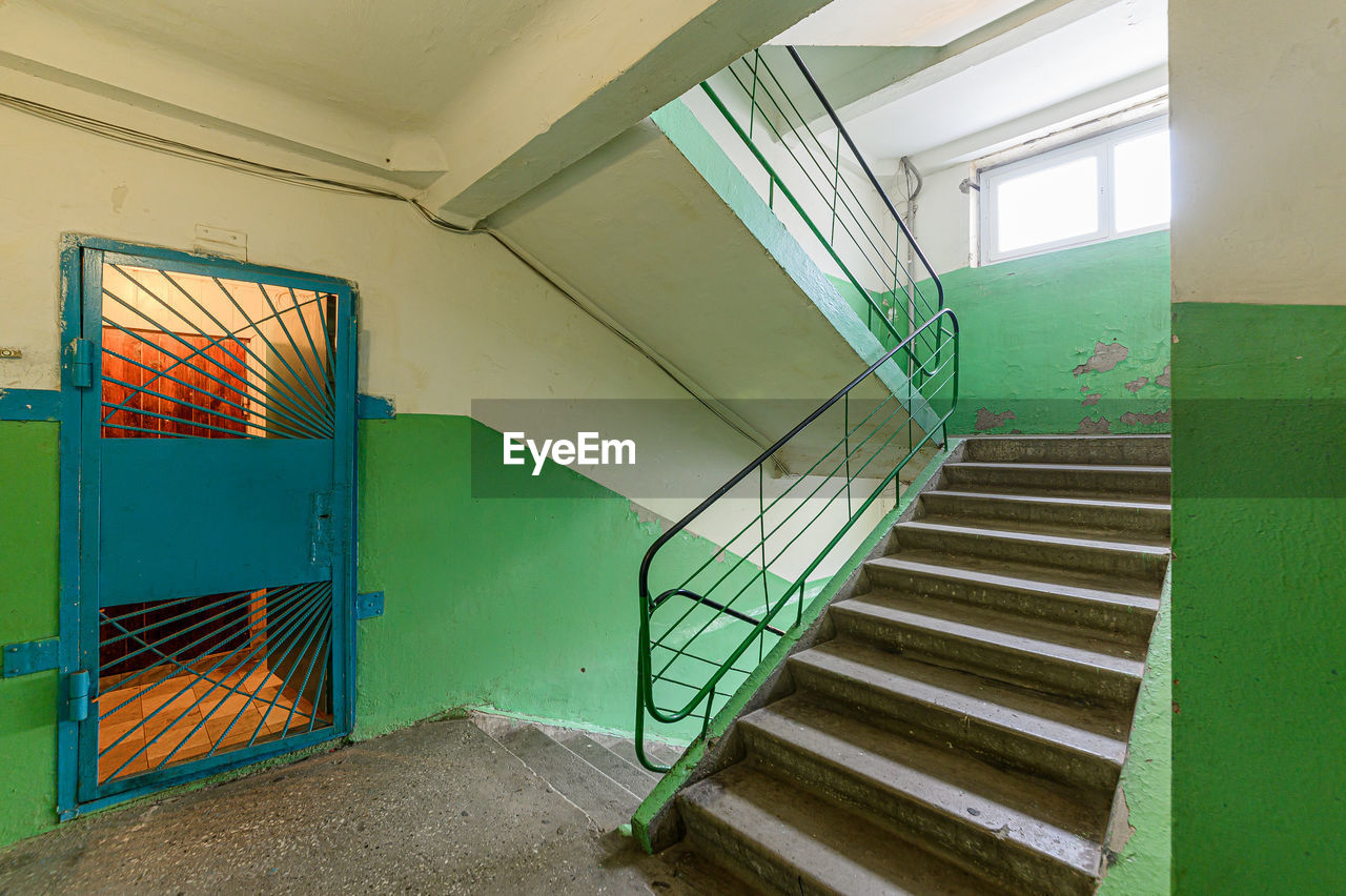 Low angle view of spiral staircase in building