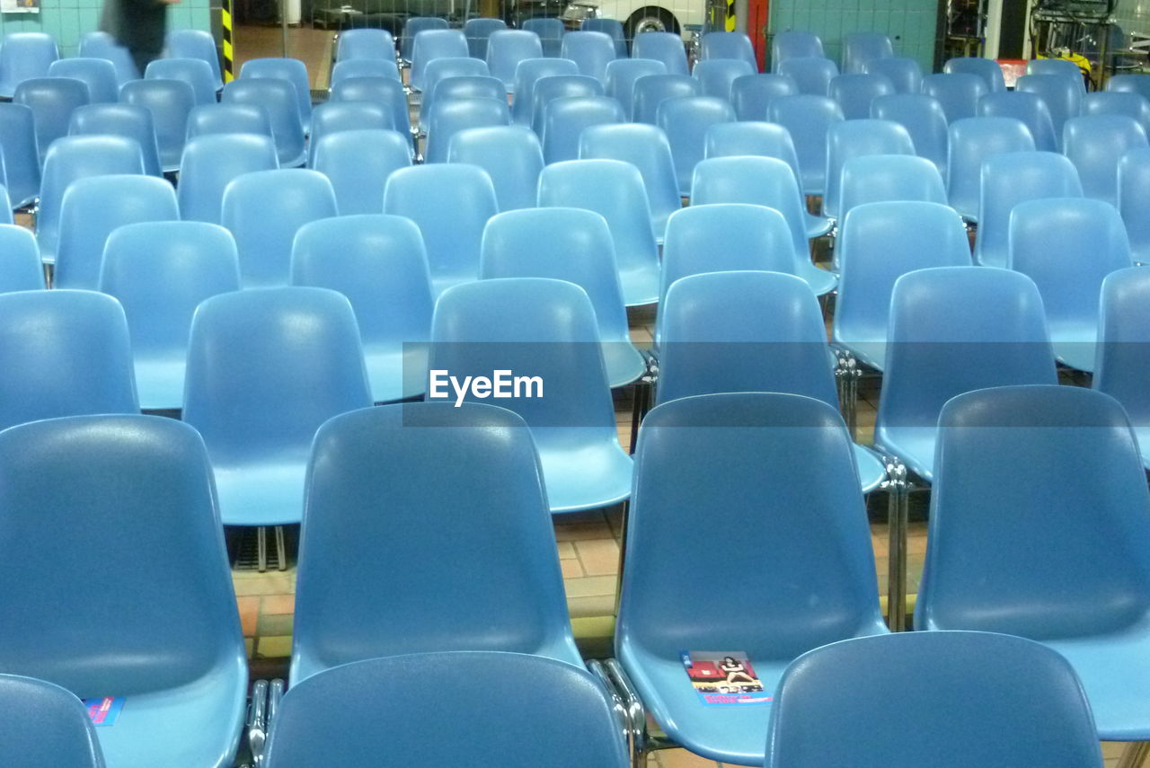 Large group of blue chairs indoor