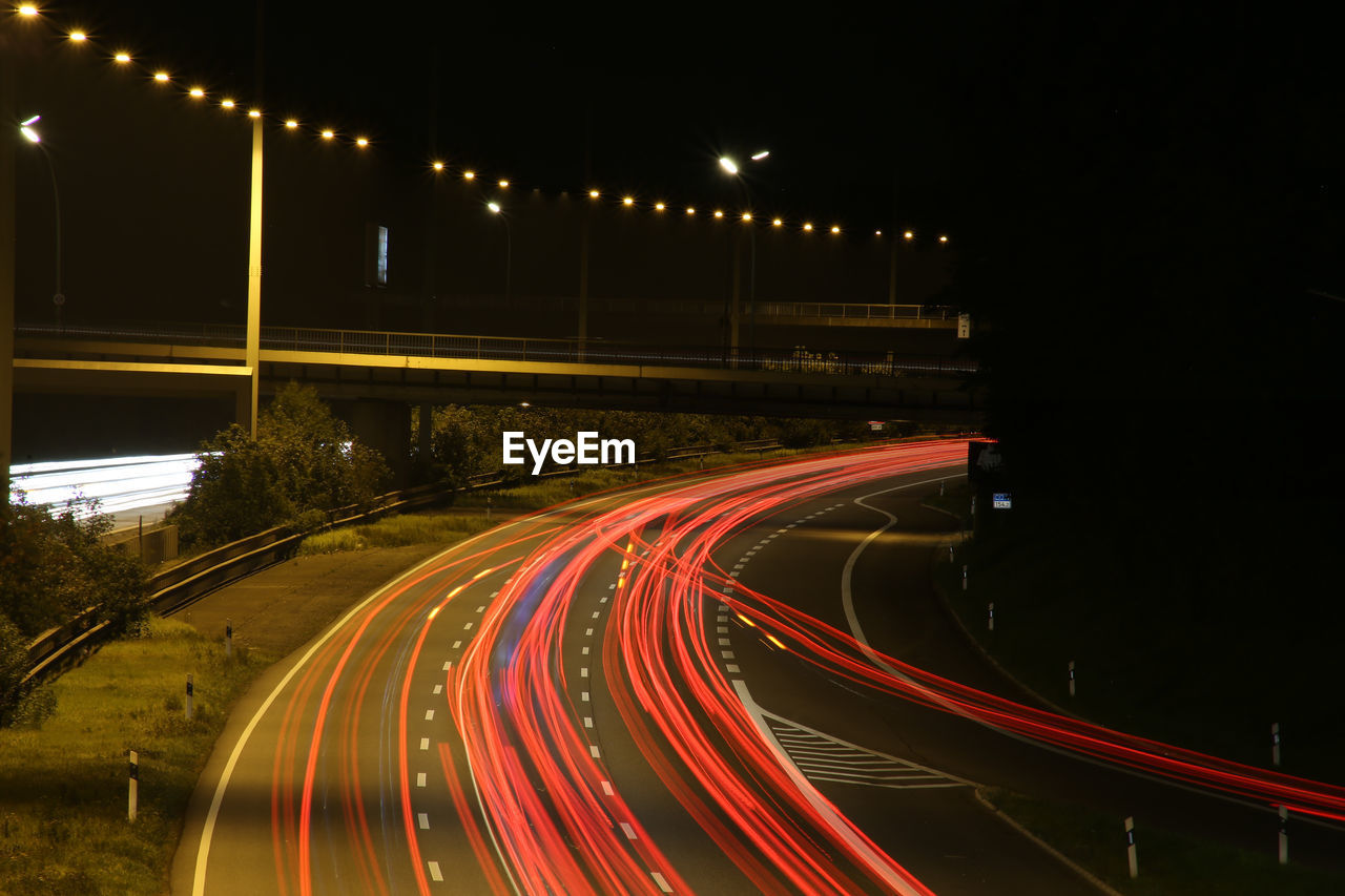 Light trails on road at night