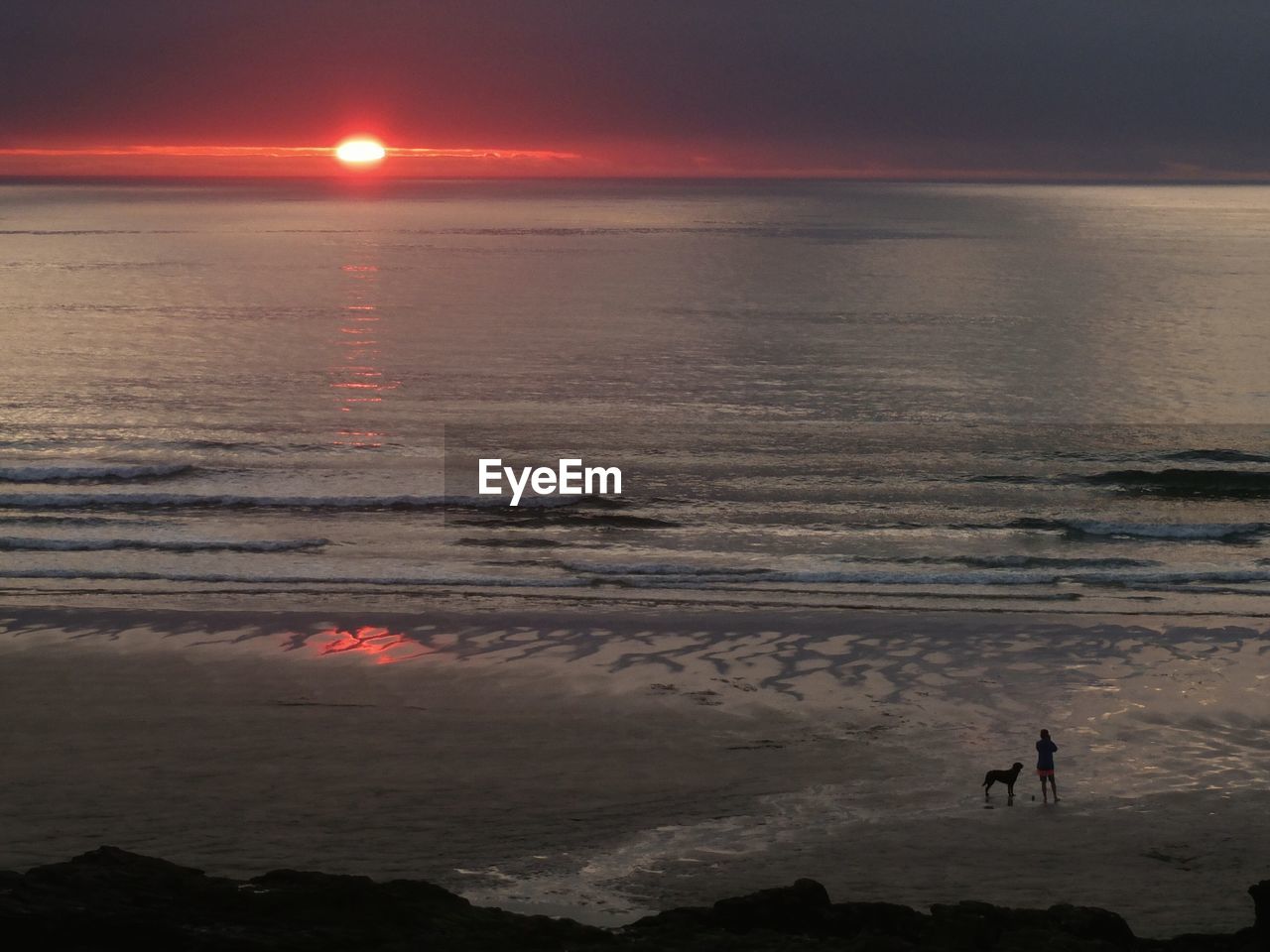 Scenic view of gwithian towans beach during sunset