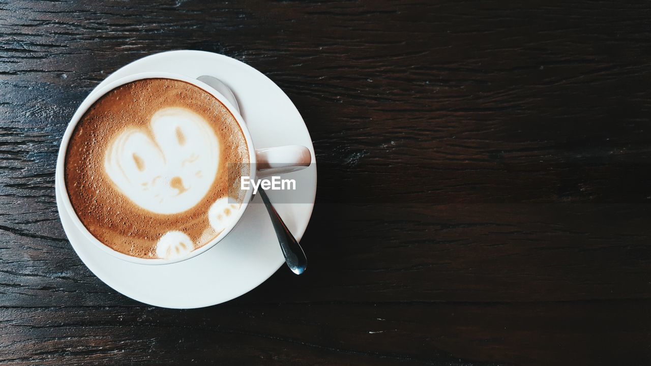 High angle view of cappuccino on table
