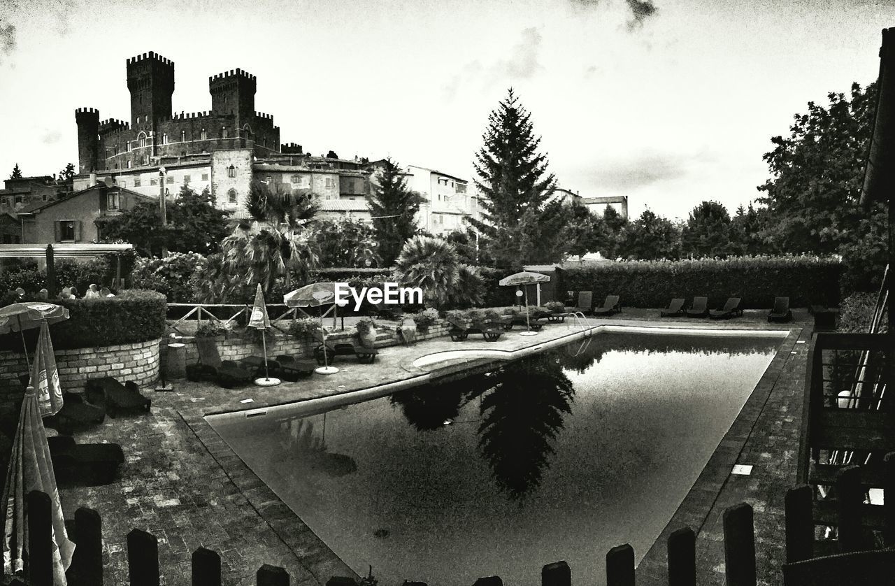 View of swimming pool against built structure