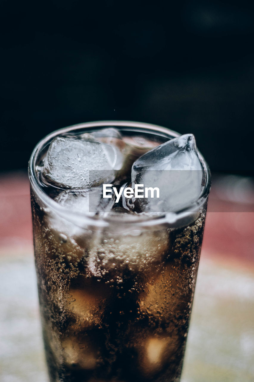 Close-up of ice glass on table