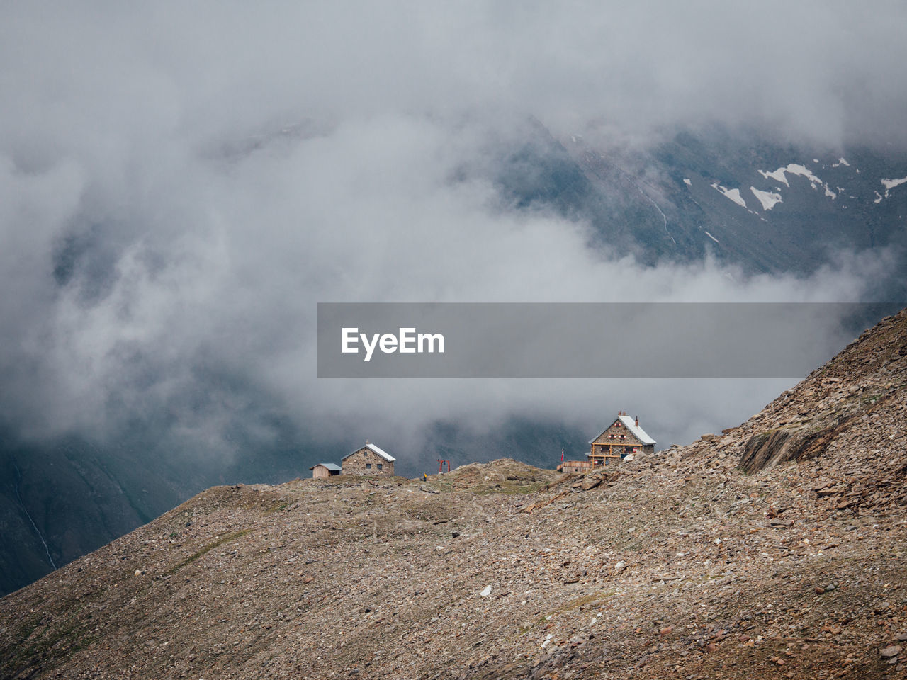 High angle view of clouds covering mountain