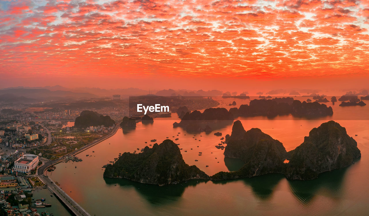 Sunrise skies on fire ha long bay