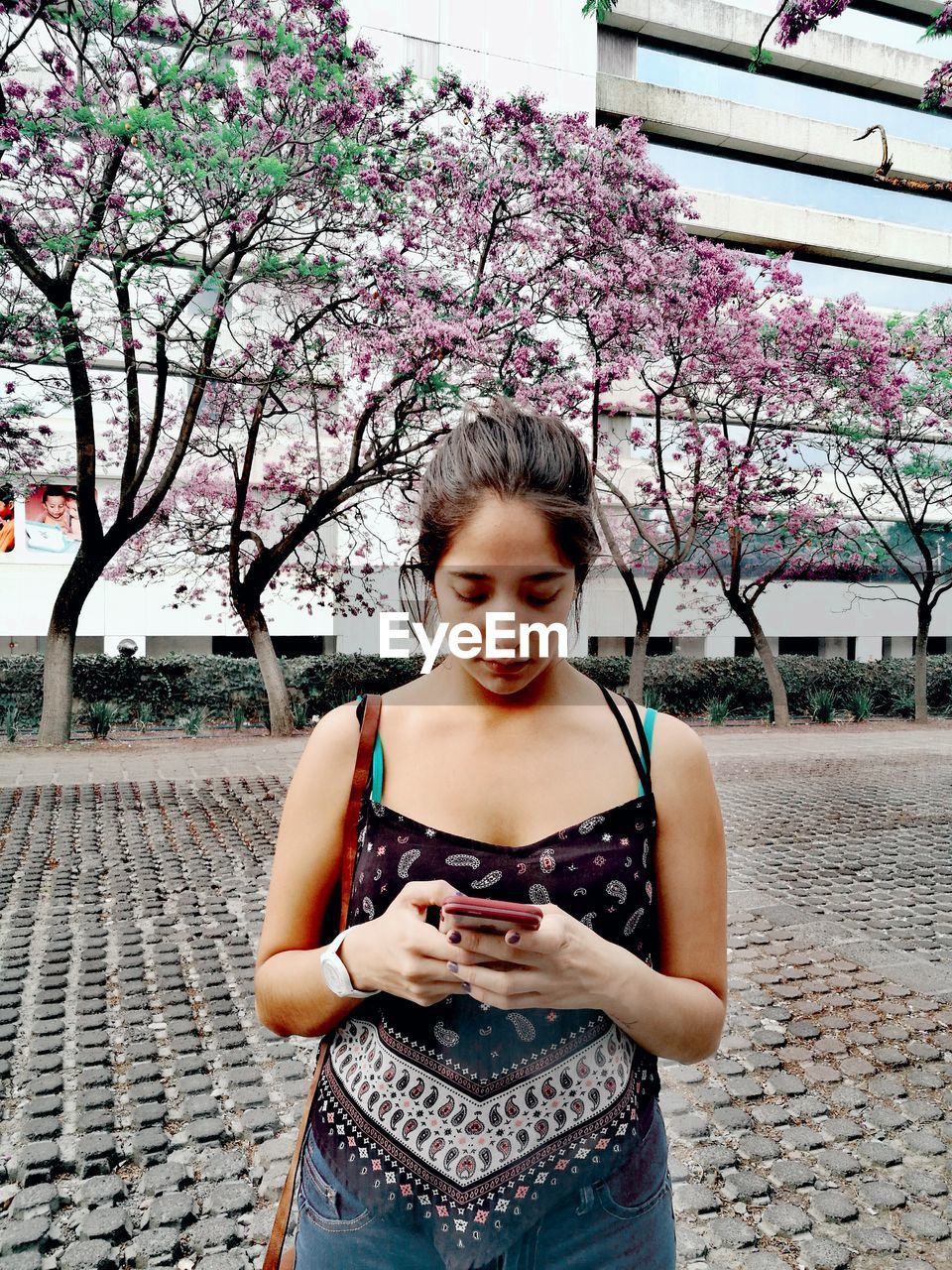 SMILING GIRL WITH FLOWER PETALS