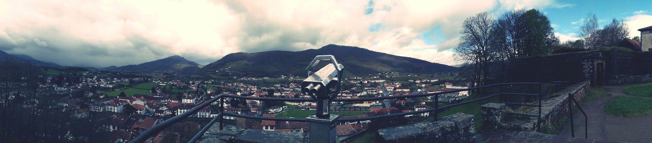 CLOUDY SKY OVER MOUNTAINS