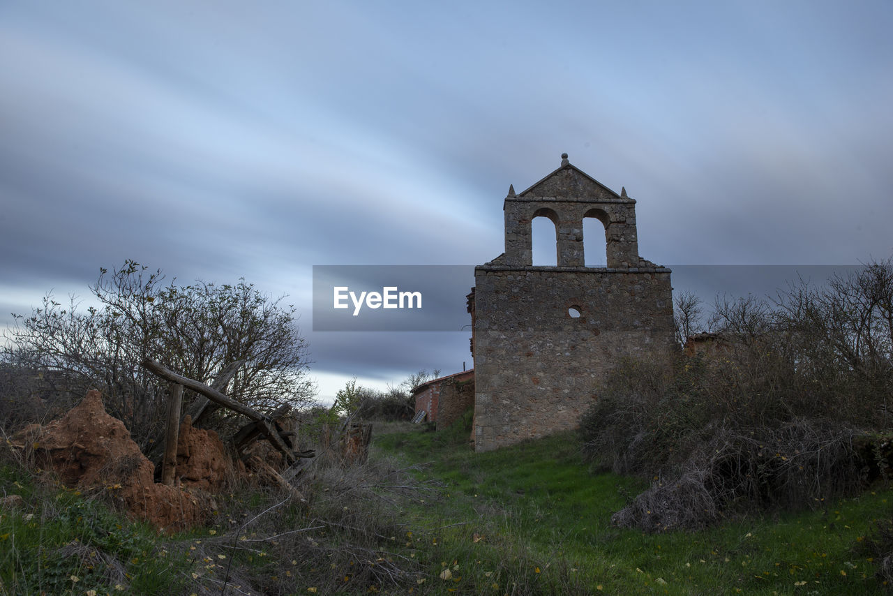 ABANDONED BUILDING AGAINST SKY