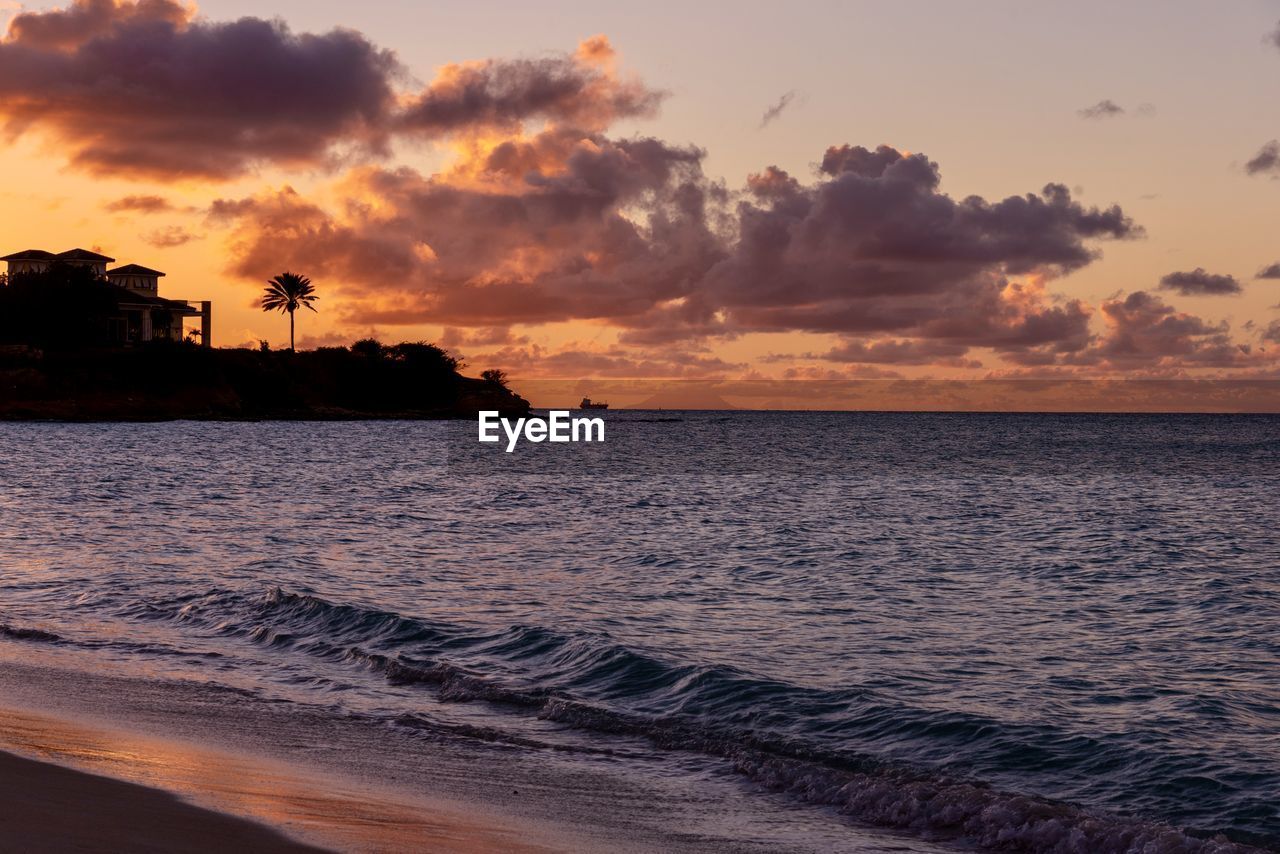 scenic view of sea against sky at sunset