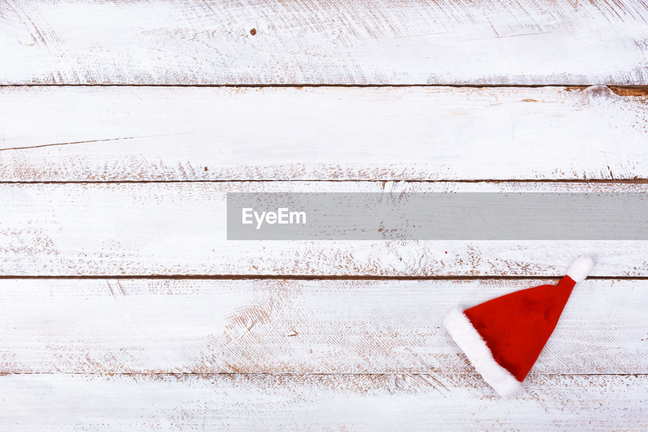 High angle view of santa hat on table