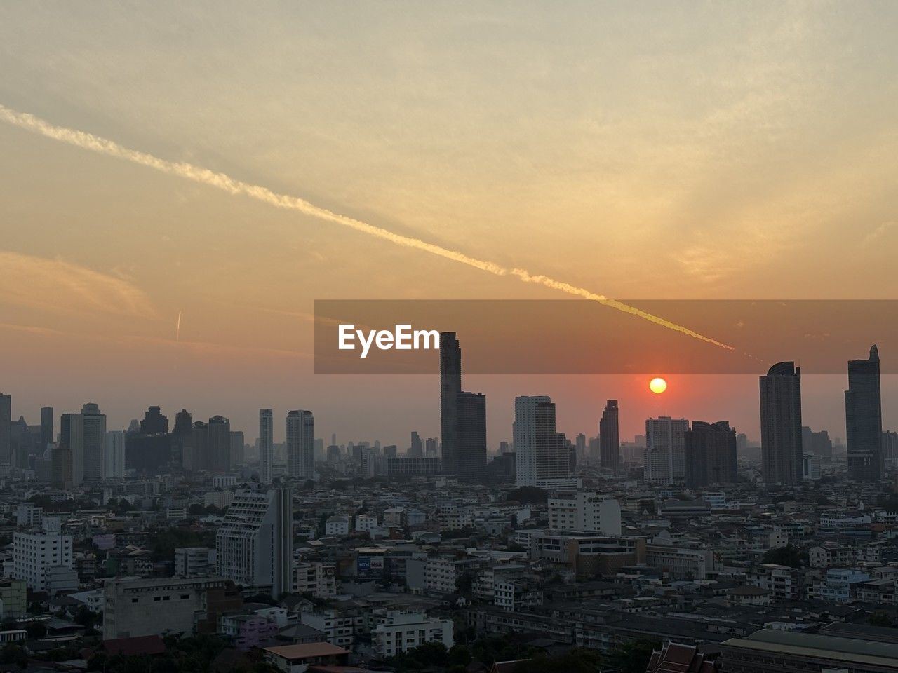 city, architecture, building exterior, built structure, building, cityscape, sky, landscape, skyscraper, office building exterior, urban skyline, horizon, skyline, sunset, residential district, nature, city life, metropolitan area, dusk, cloud, downtown district, urban area, travel destinations, evening, no people, metropolis, environment, business finance and industry, high angle view, outdoors, business, development, sun, dramatic sky, illuminated, sunlight, tower, downtown, street, transportation, fog, office, travel, aerial view, afterglow, pollution
