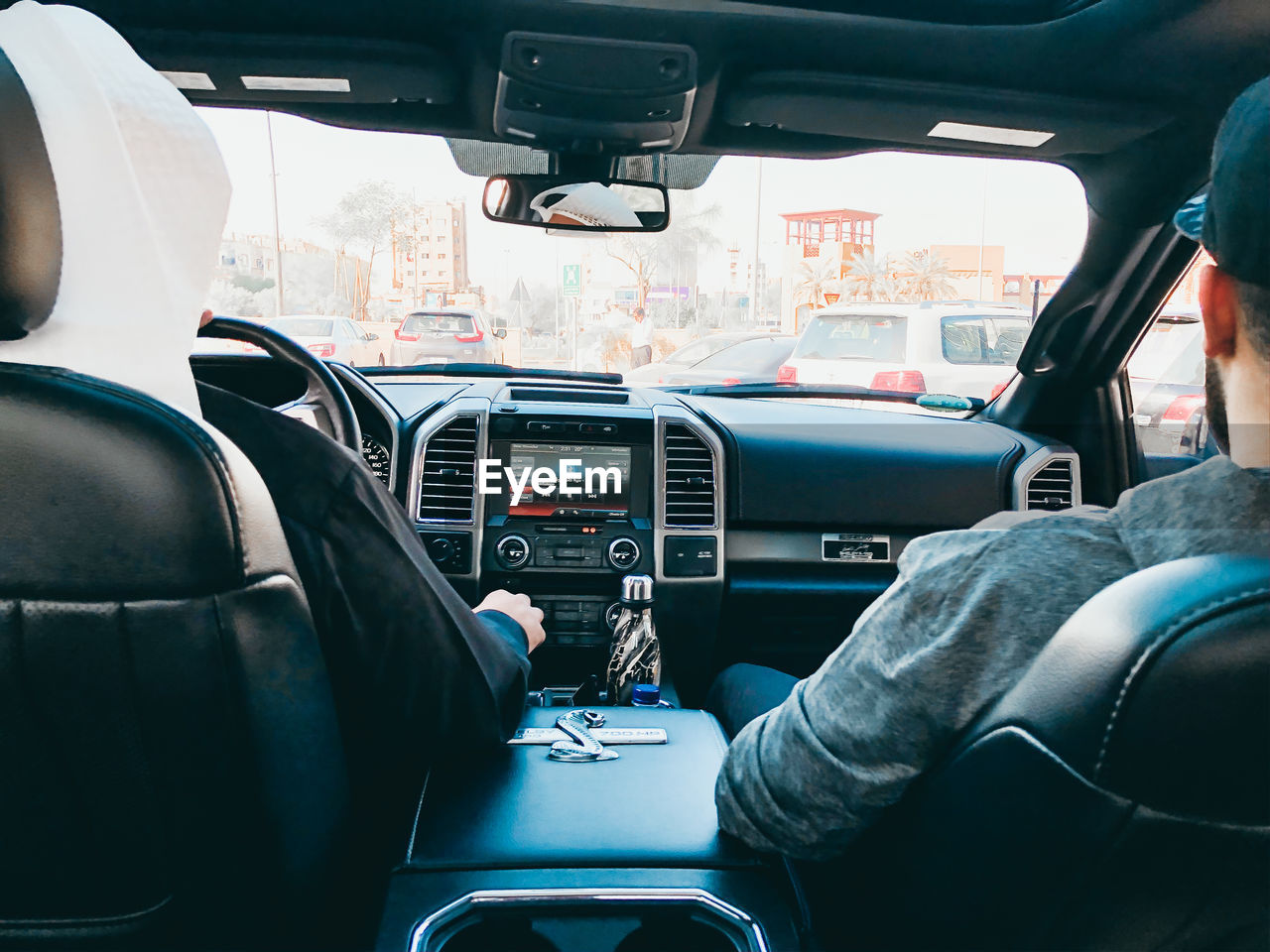 People sitting in car