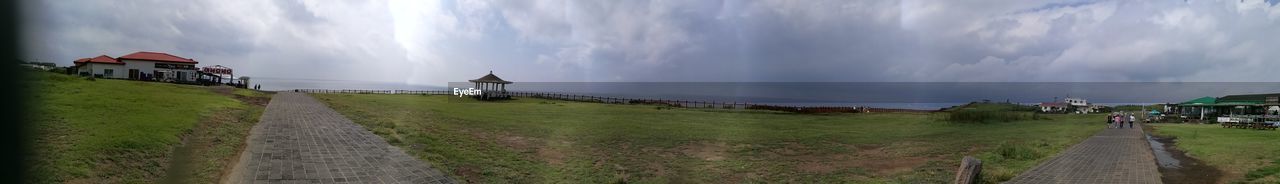 Panoramic view of road leading towards sea