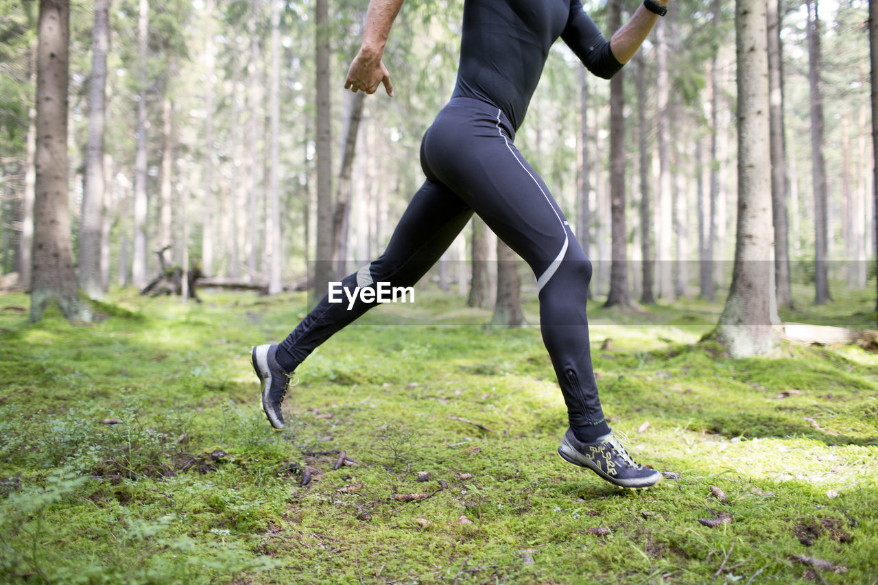 Man running in forest