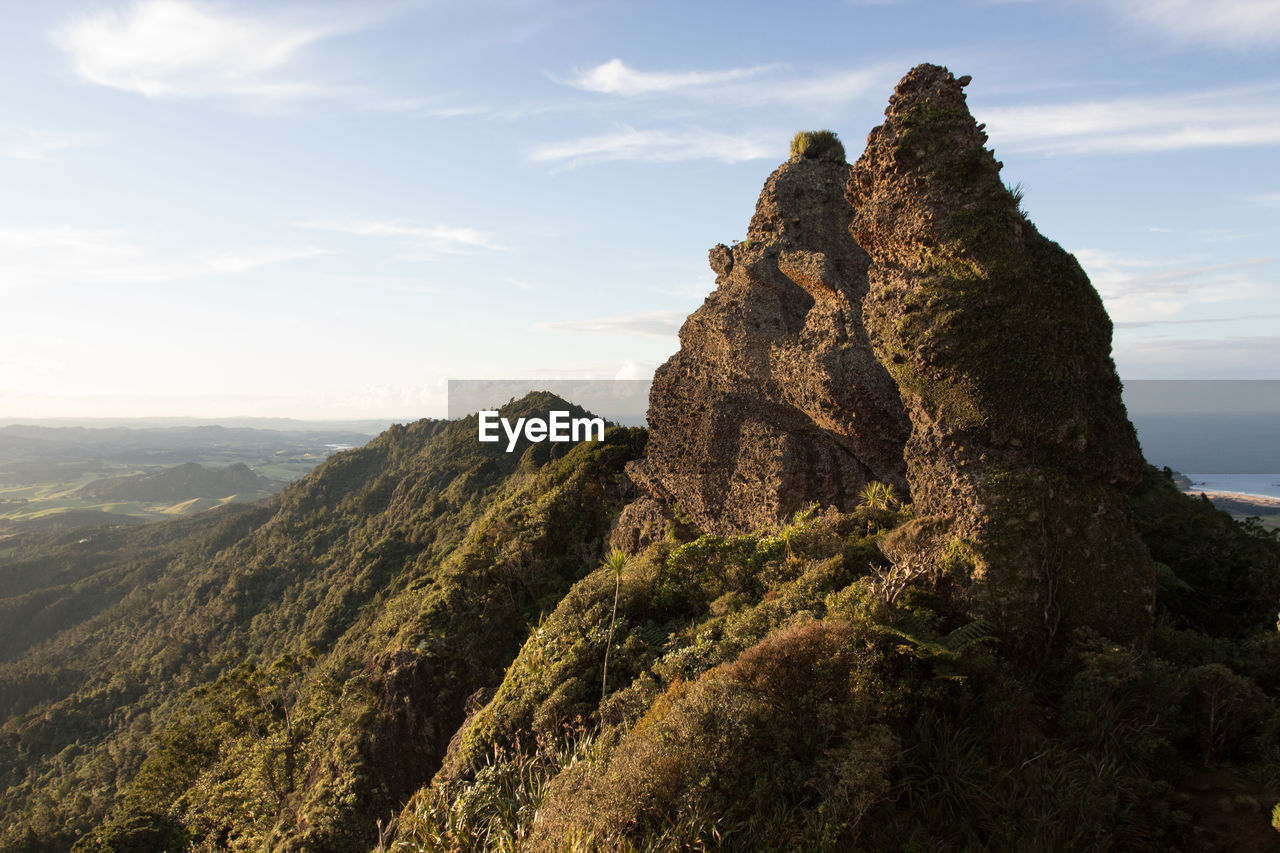 SCENIC VIEW OF ROCK FORMATION AGAINST SKY