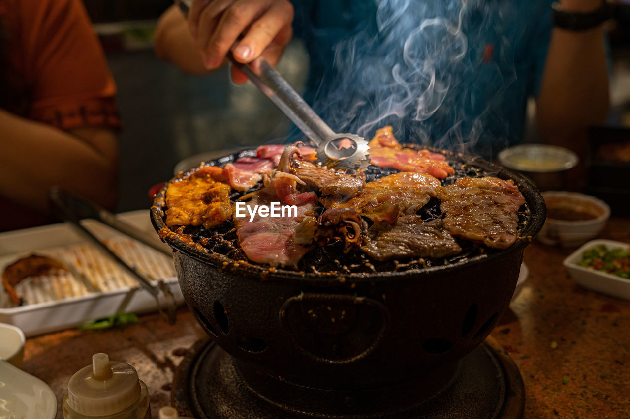 Close-up of person preparing food