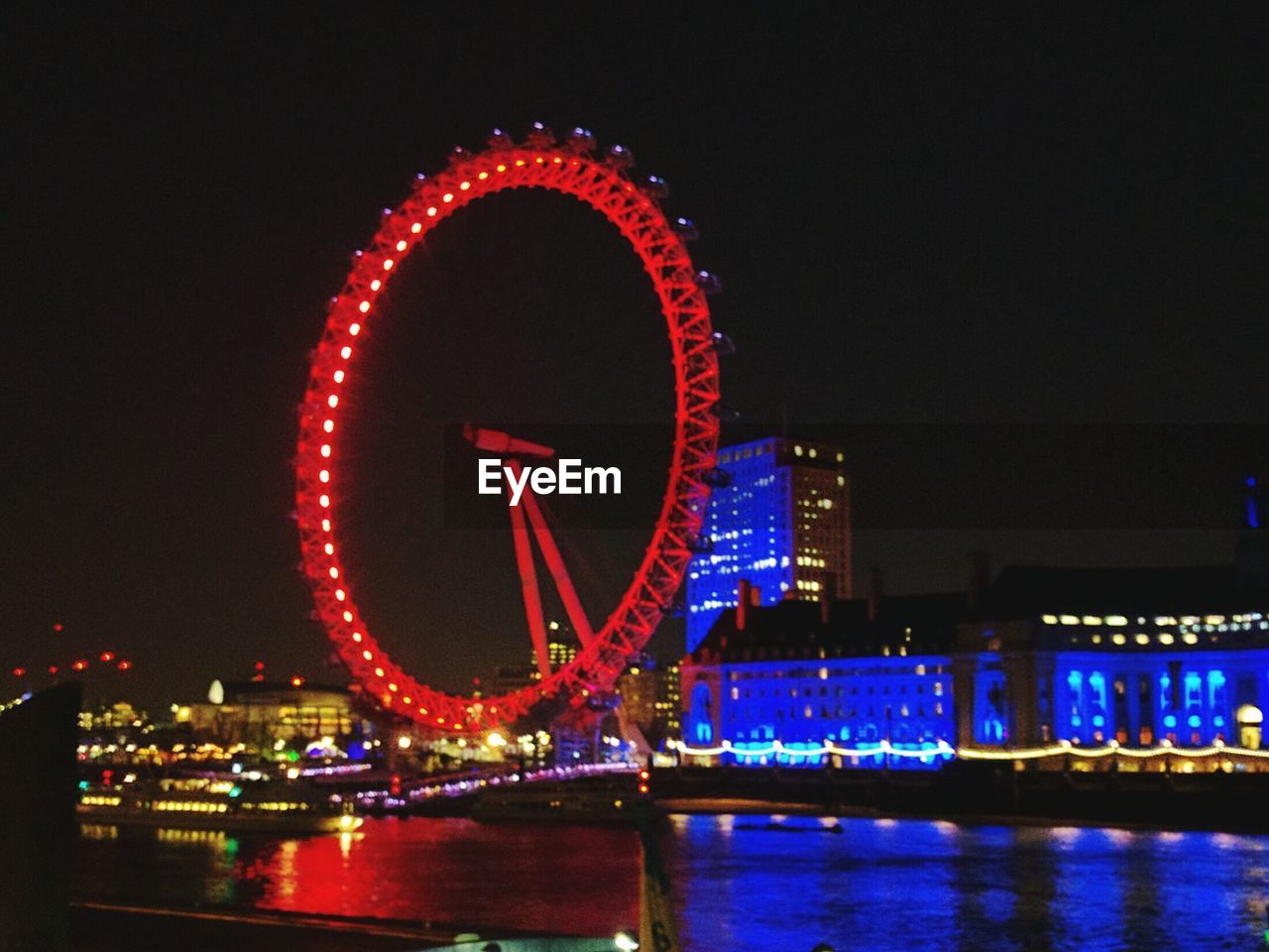 VIEW OF ILLUMINATED FERRIS WHEEL