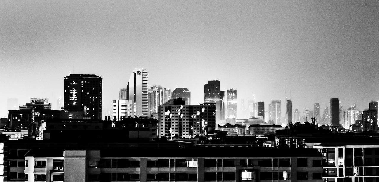 View of cityscape against clear sky