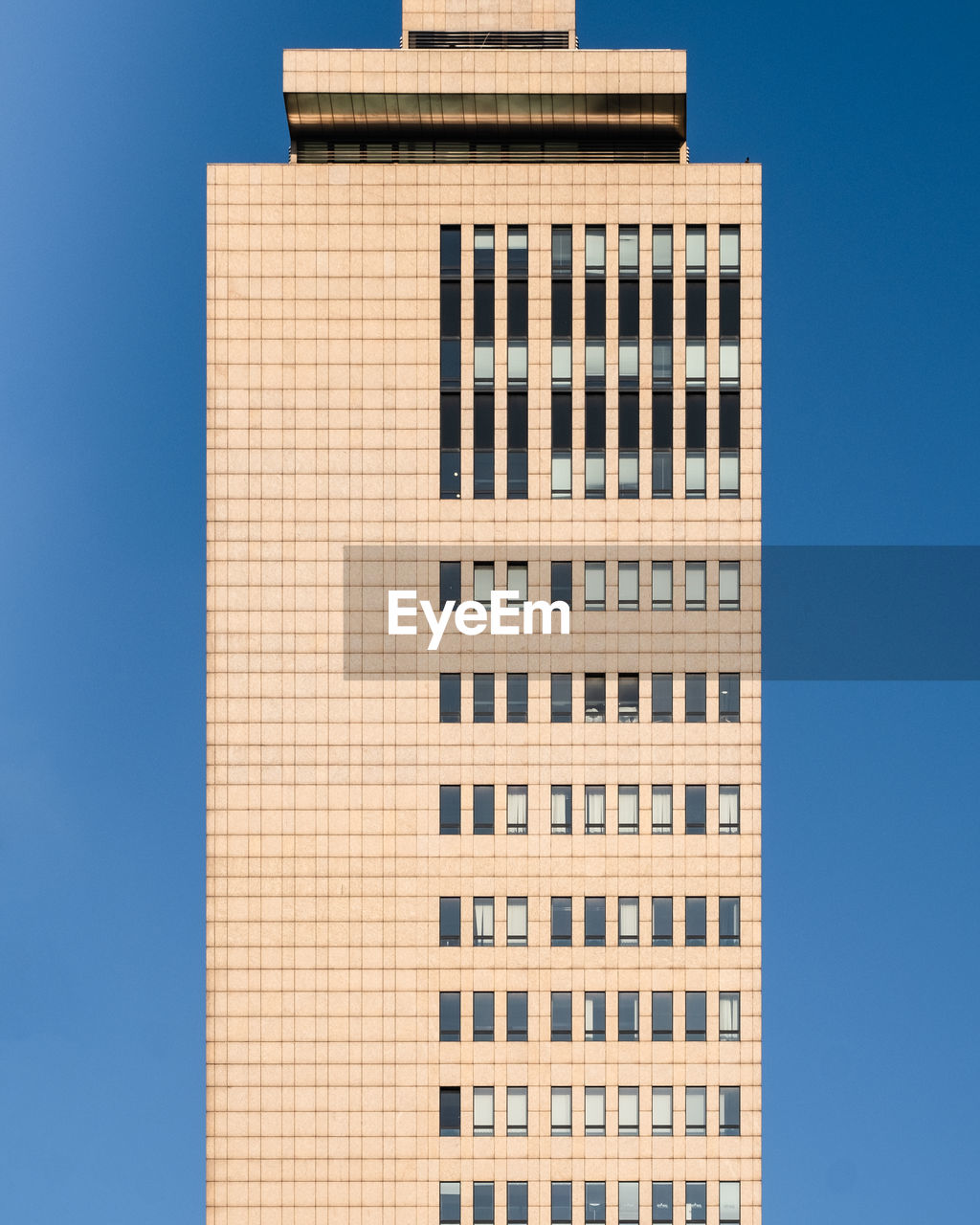 Low angle view of building against blue sky