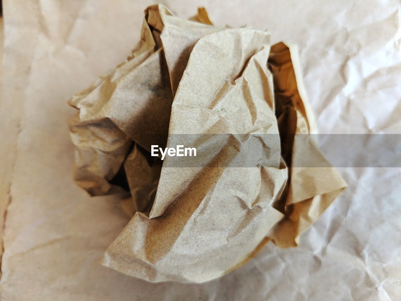 High angle view of crumpled paper ball