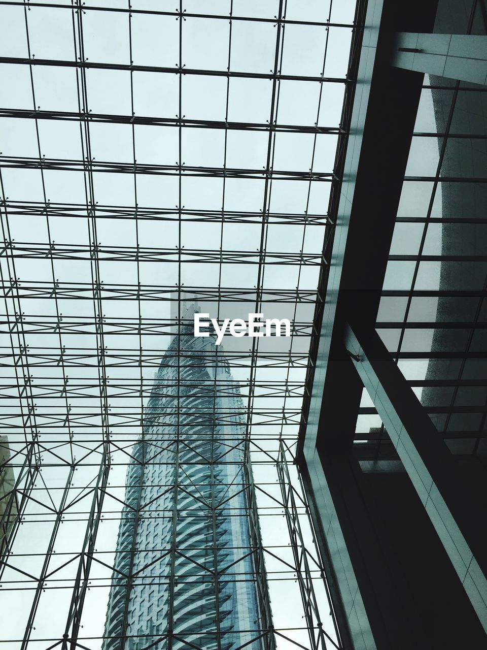 Low angle view of dubai mall seen through skylight